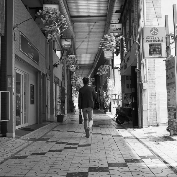 Salaryman in a shotengai Salaryman in a shotengai